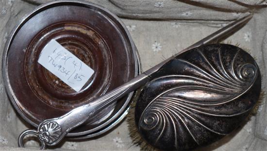 Two George III silver wine coasters, London, 1798 and 1814, two silver mounted brushes and a 19th century silver meat skewer.